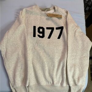 Fear of God Essentials 1977 heather grey and black crewneck sweatshirt